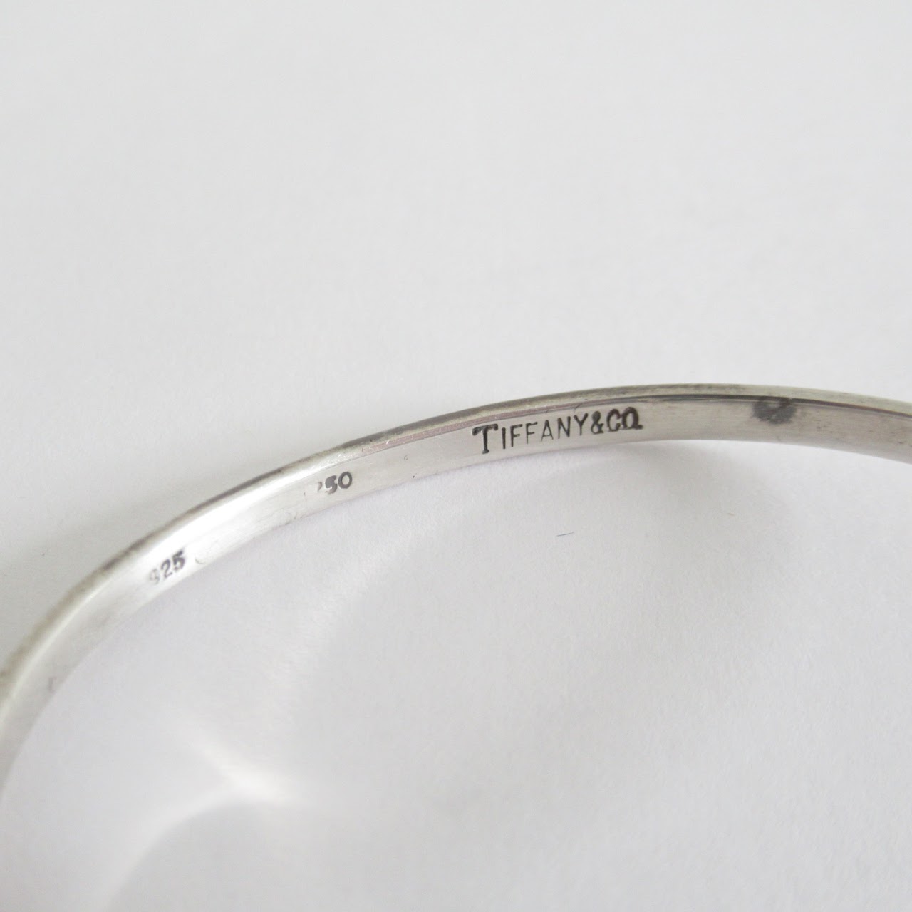 Tiffany & Co. Sterling Silver & 18K Gold Interlocking Hearts Bangle