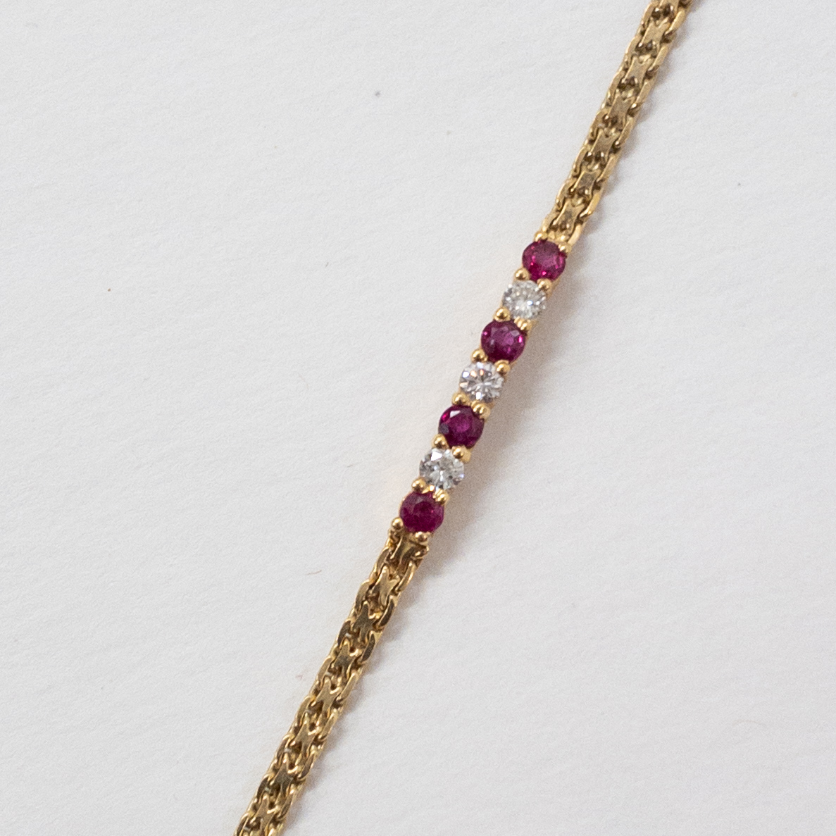 14K Gold Bracelet with Diamonds and Garnets