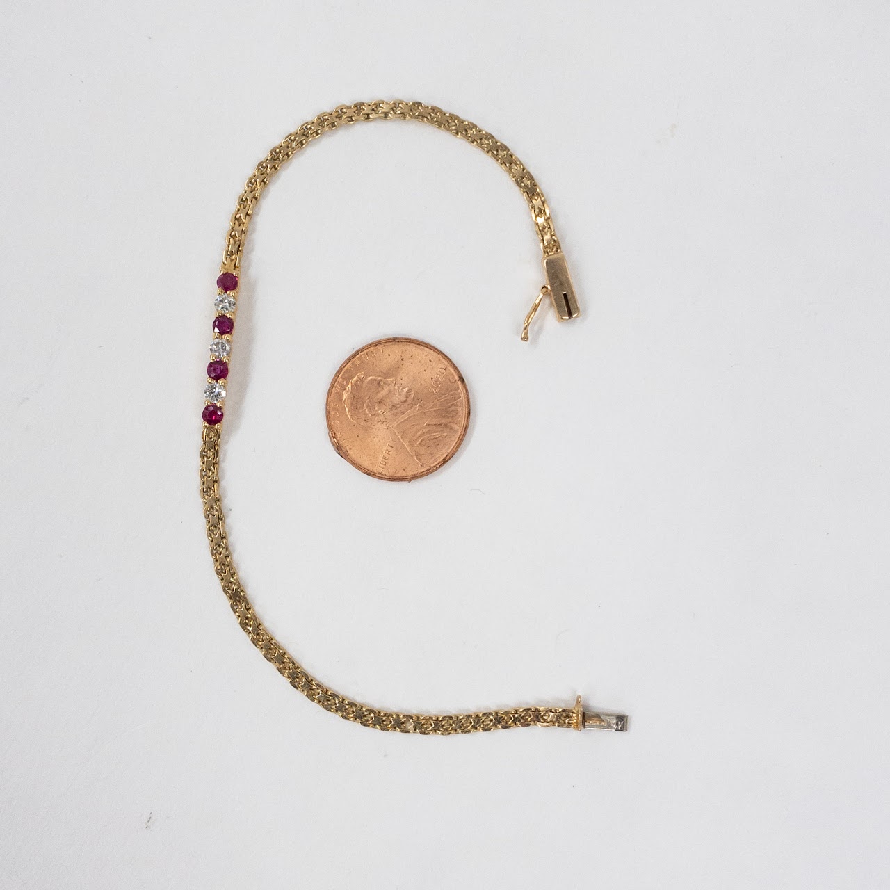 14K Gold Bracelet with Diamonds and Garnets