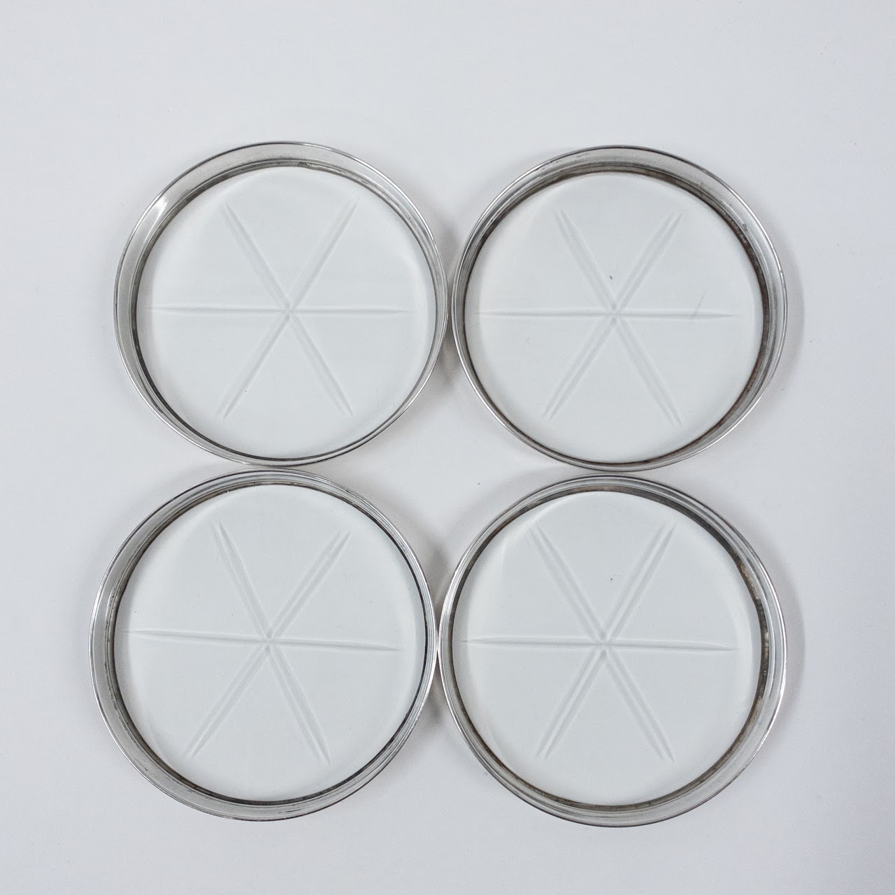 Sterling Silver and Cut Glass Set of Seven Coasters and Holder