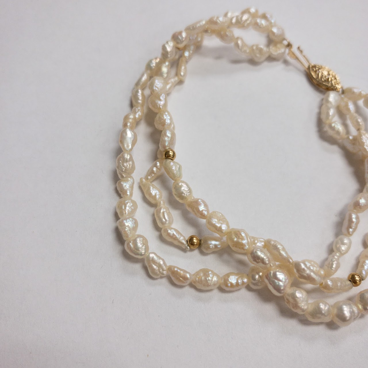 Pearl and 14K Gold Triple Strand Bracelet