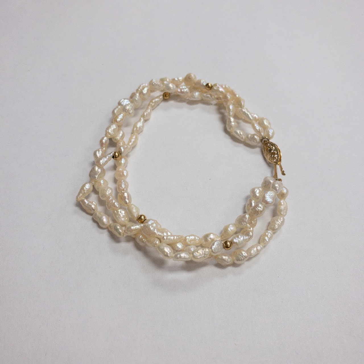 Pearl and 14K Gold Triple Strand Bracelet