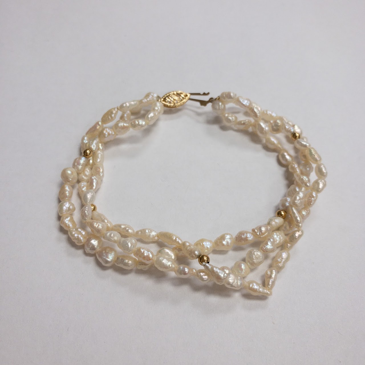 Pearl and 14K Gold Triple Strand Bracelet