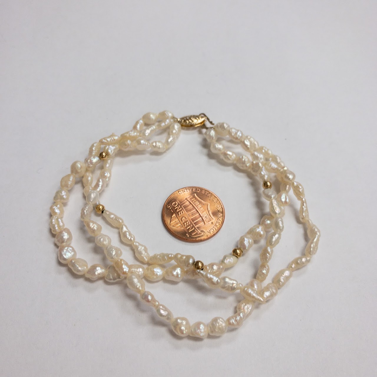 Pearl and 14K Gold Triple Strand Bracelet