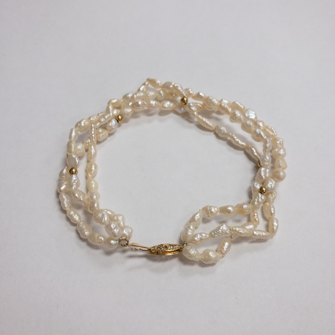 Pearl and 14K Gold Triple Strand Bracelet