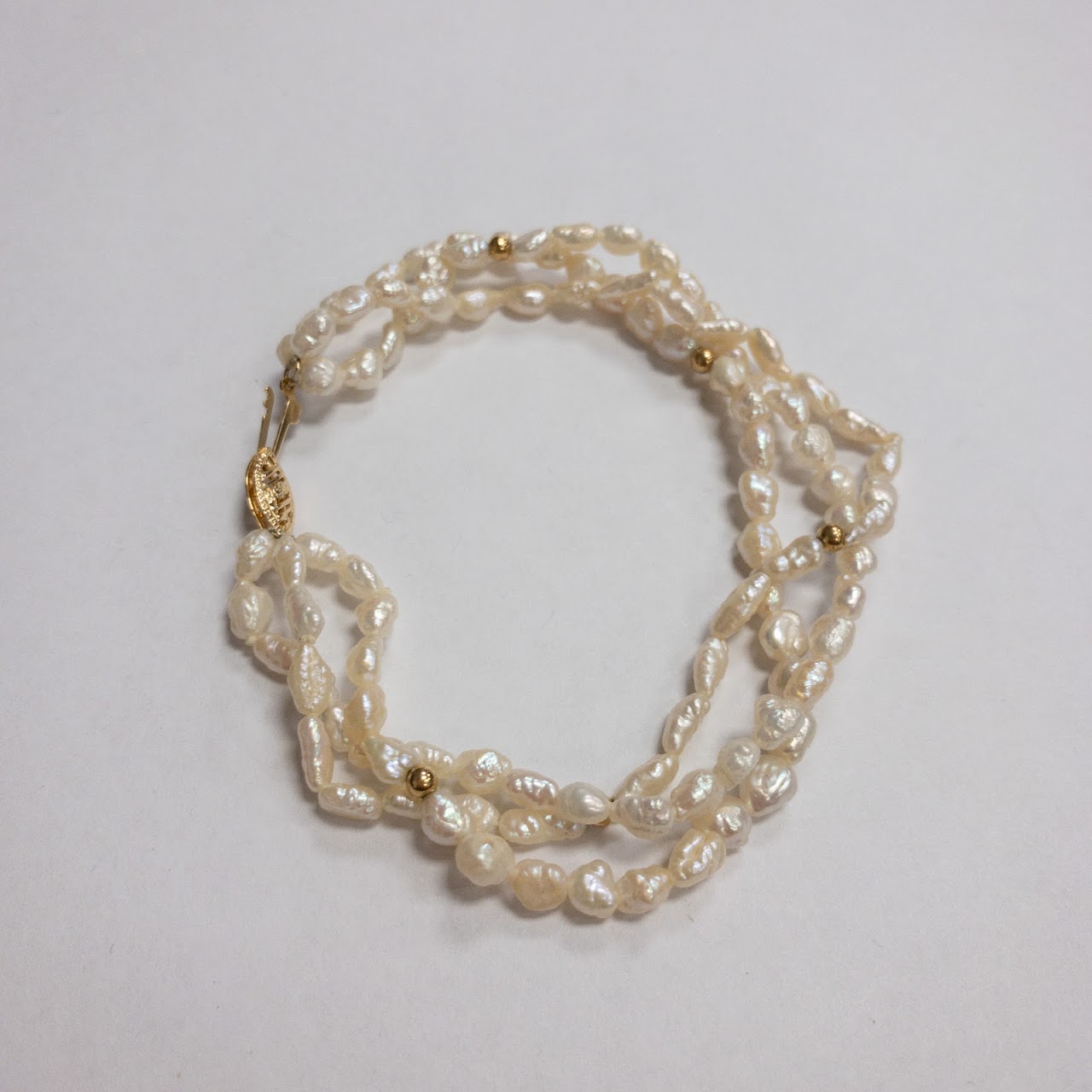 Pearl and 14K Gold Triple Strand Bracelet