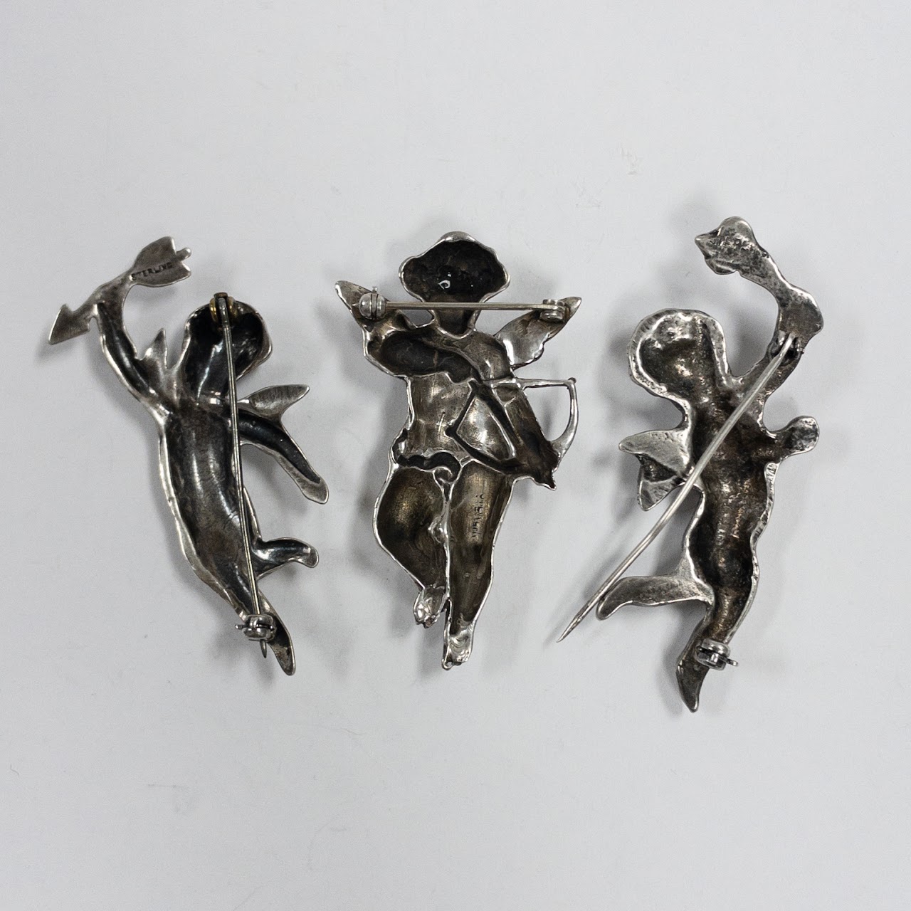 Sterling Silver Cherub Brooch Lot