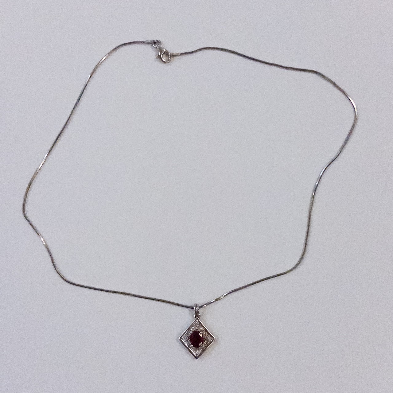 18K White Gold, Ruby and Diamond Pendant on Sterling Silver Chain