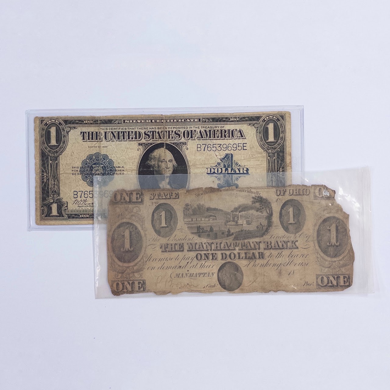 Two Antique Paper Dollar Certificates