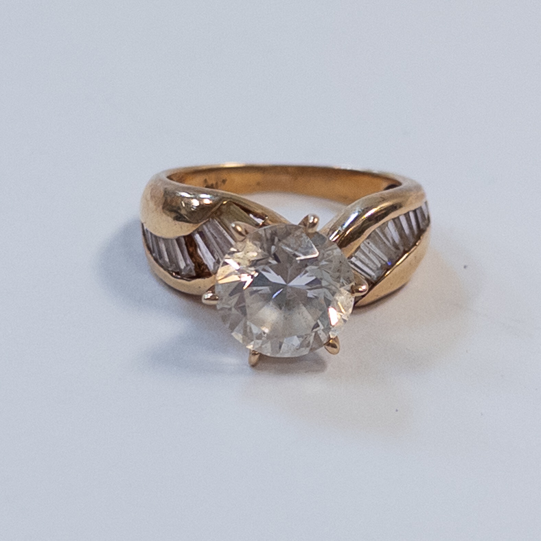 14K Gold Ring with Baguette and Diamond Cut Crystals