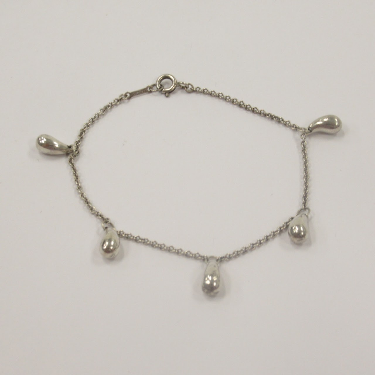 Tiffany & Co. X Elsa Peretti Sterling Silver Teardrop Necklace, Bracelet, and Earring Set