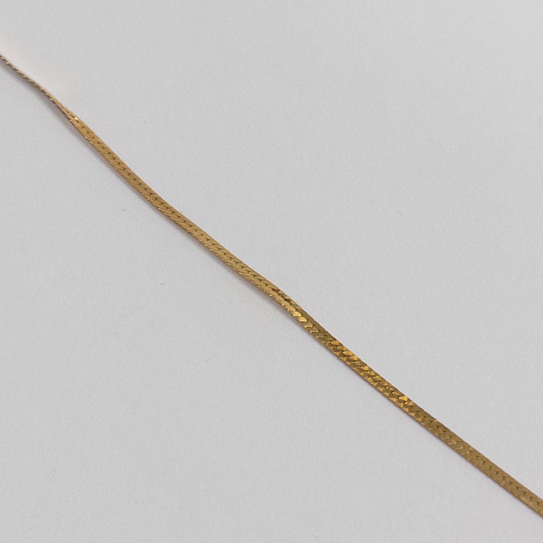 14K Gold Thin Herringbone Bracelet