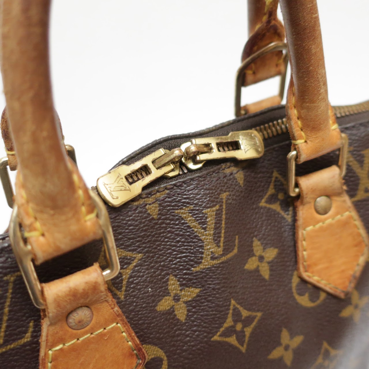 Louis Vuitton Alma Monogram Canvas Bag