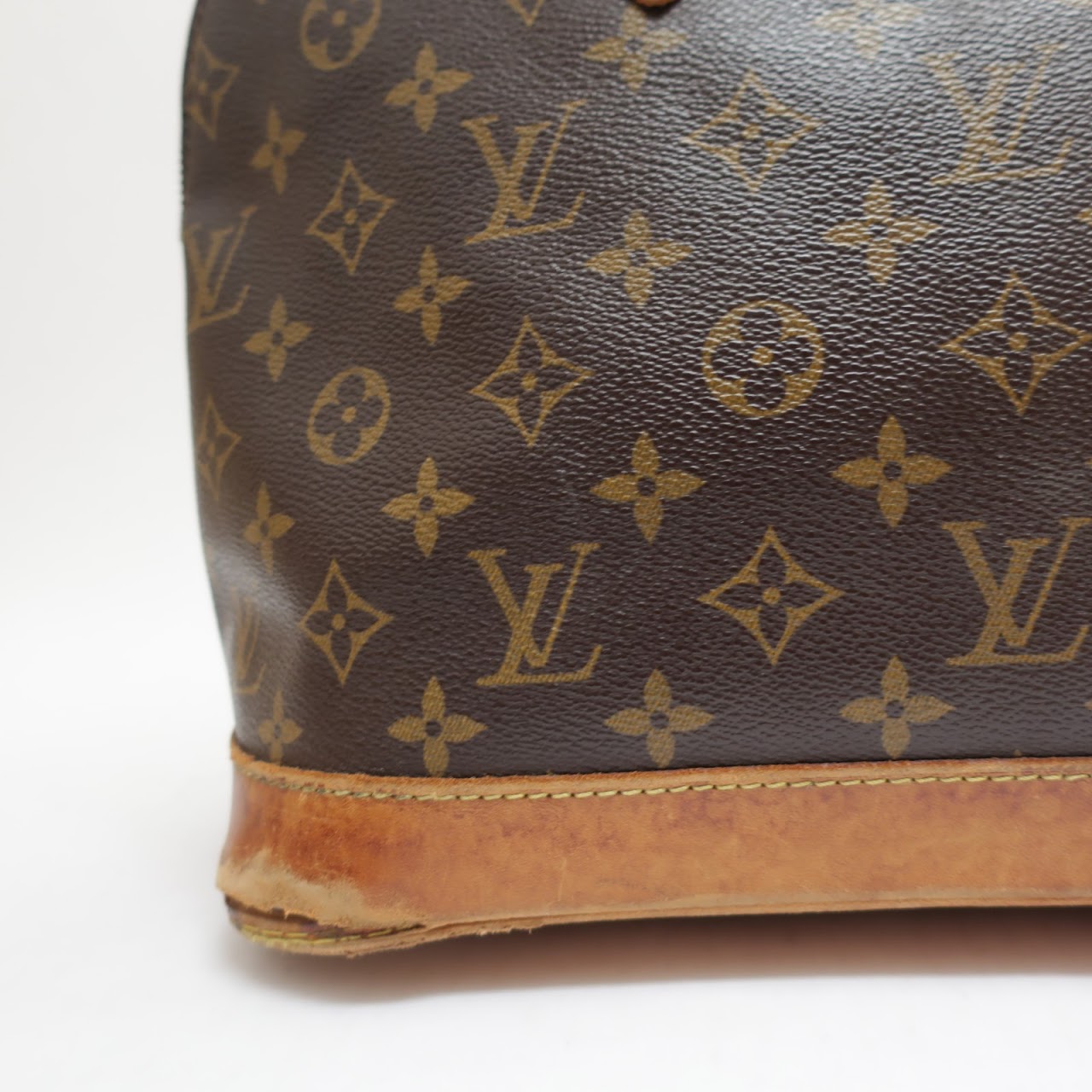 Louis Vuitton Alma Monogram Canvas Bag