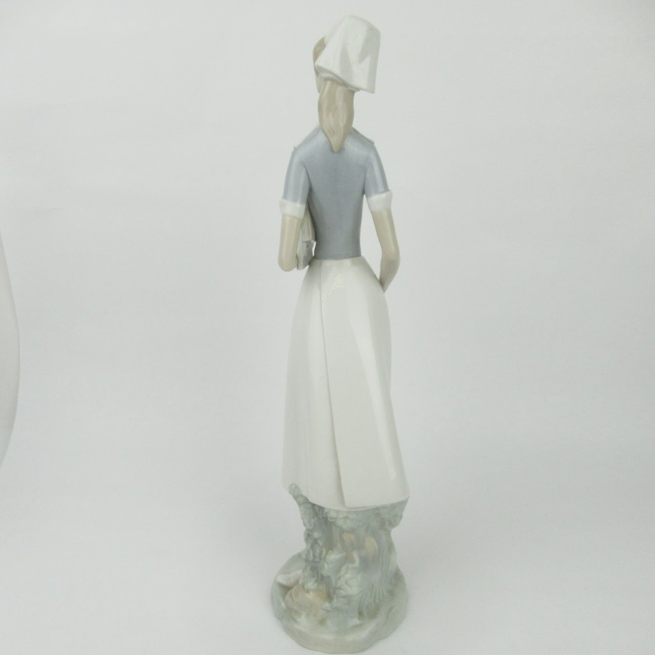 Lladró Nurse Figurine