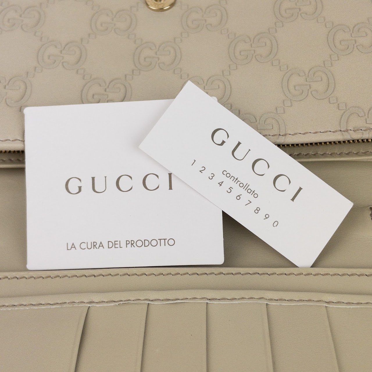 Gucci Monogram Leather Chain Wallet