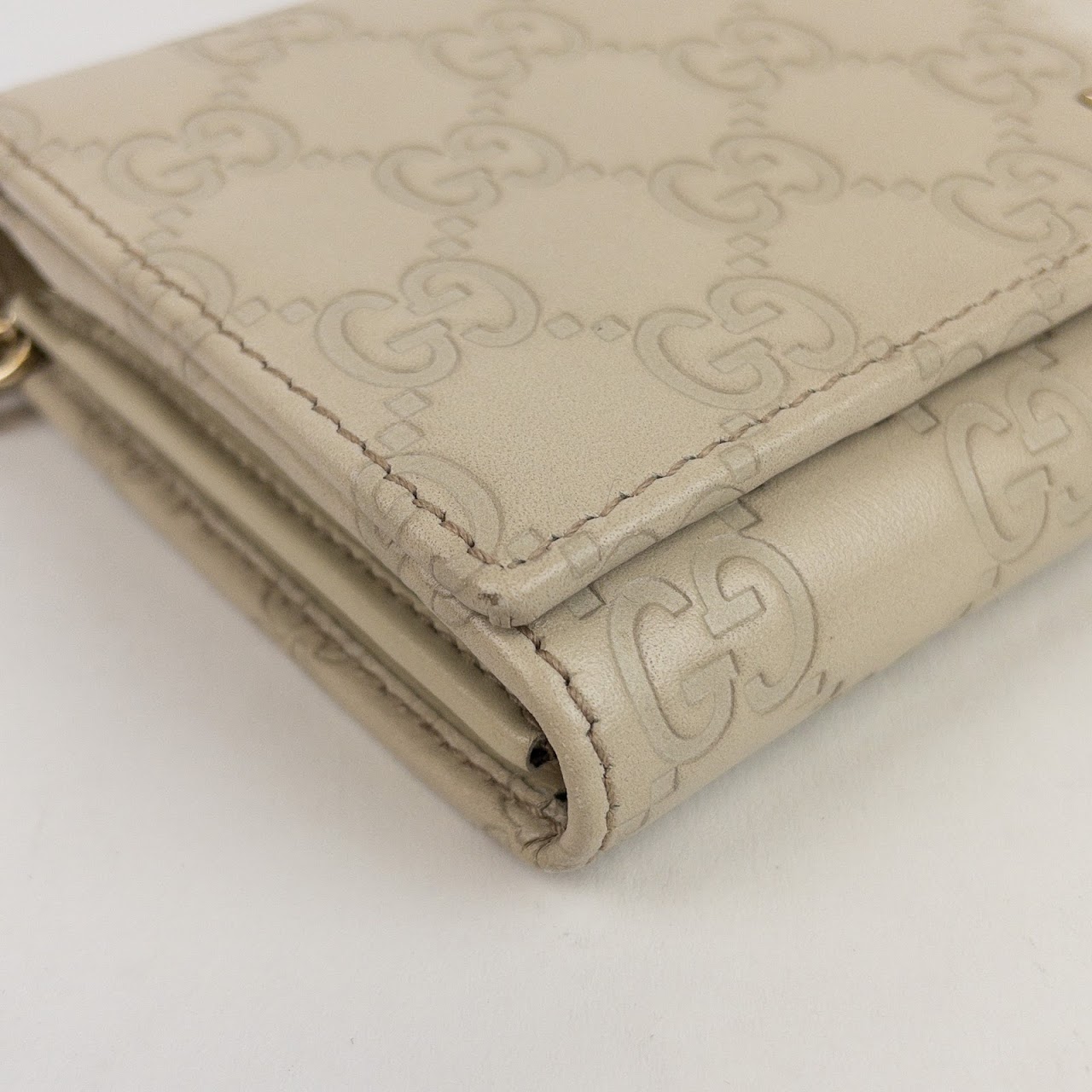 Gucci Monogram Leather Chain Wallet