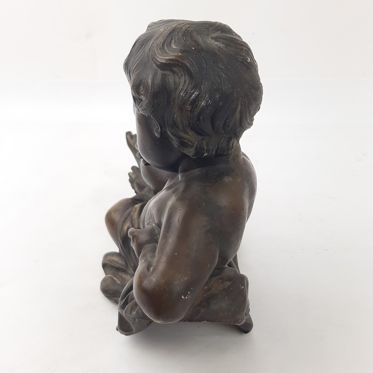 Courant Bronze Cherub Sculpture