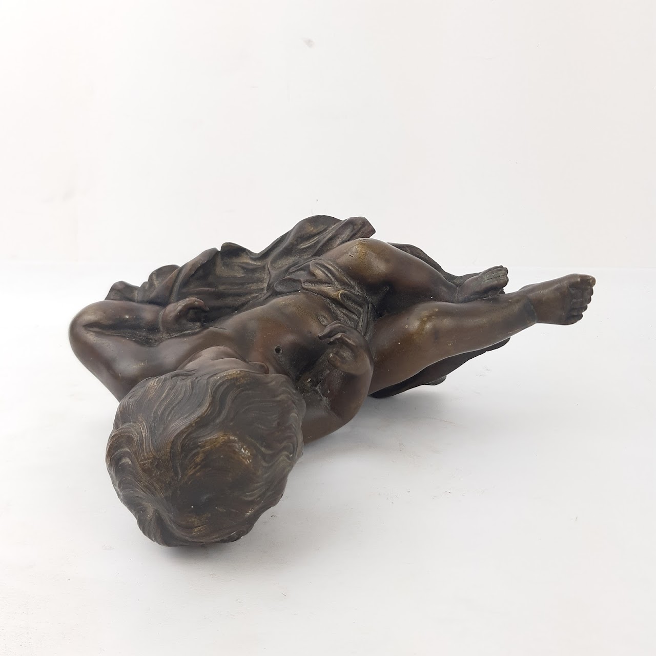 Courant Bronze Cherub Sculpture