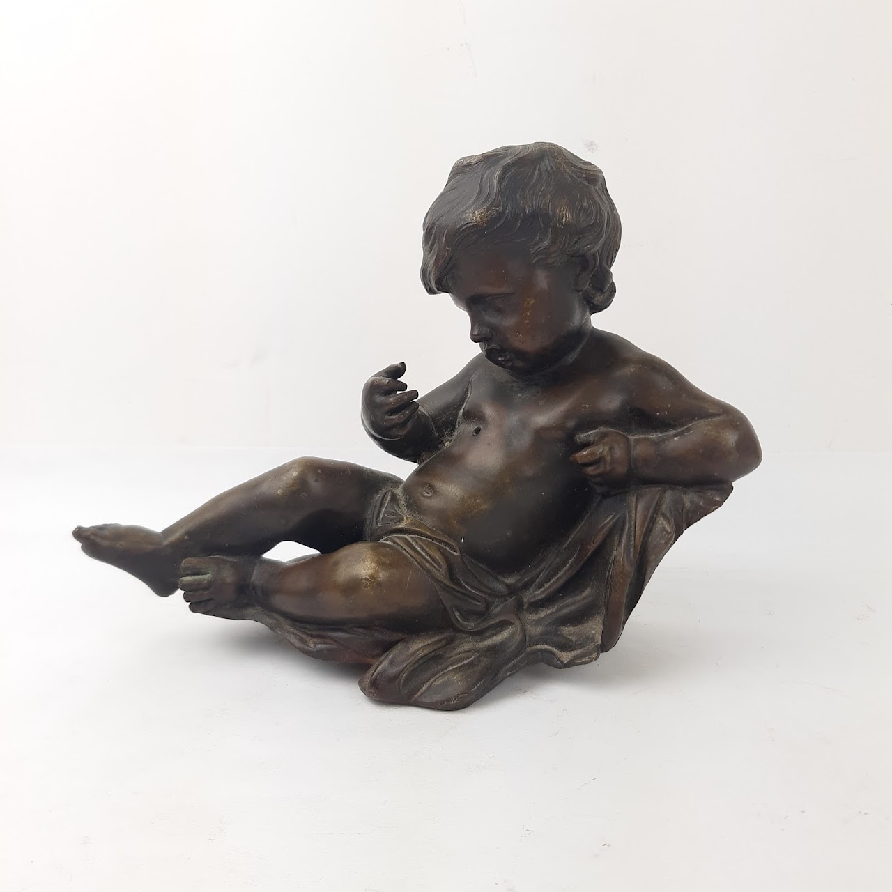 Courant Bronze Cherub Sculpture