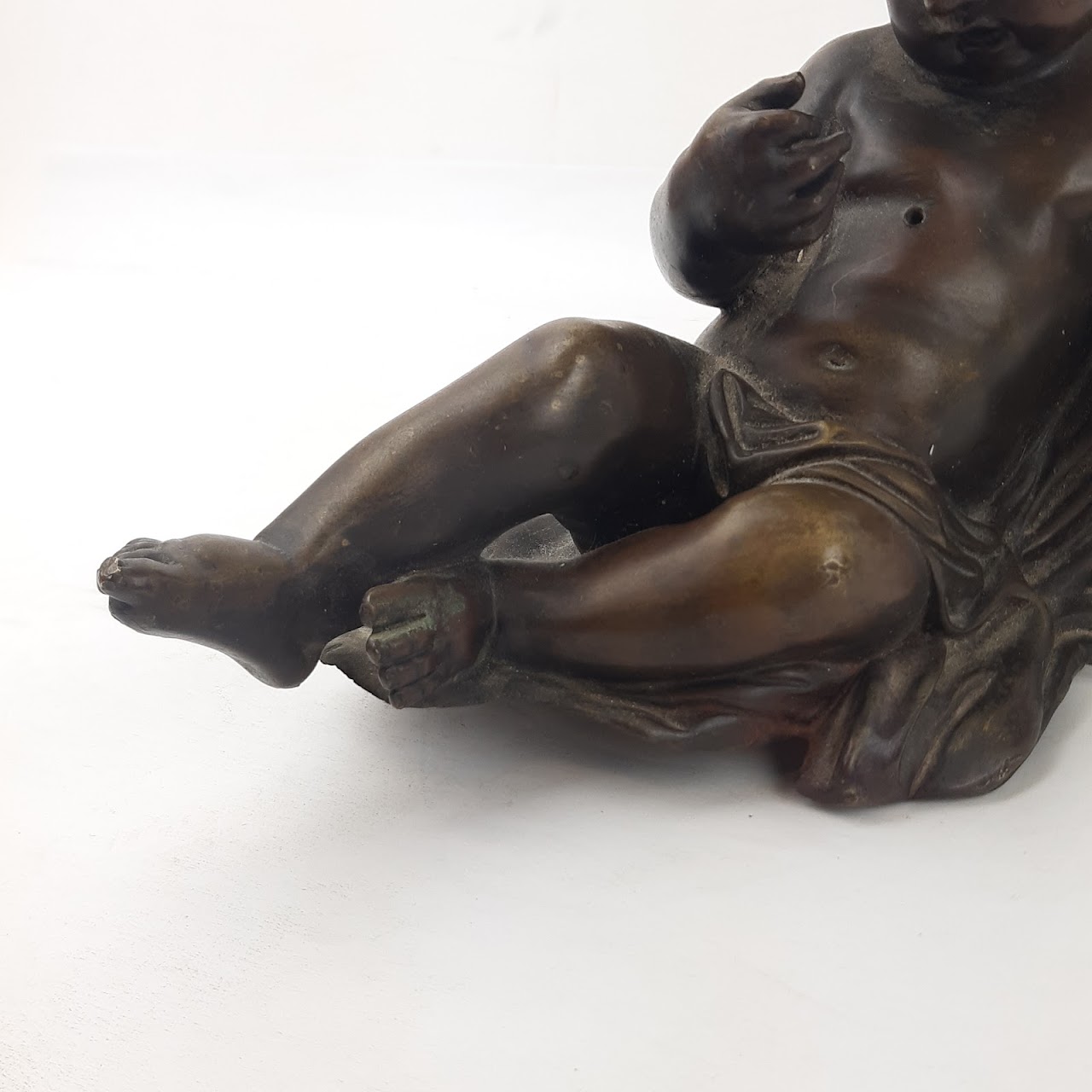 Courant Bronze Cherub Sculpture