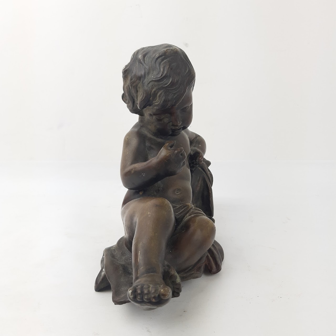 Courant Bronze Cherub Sculpture