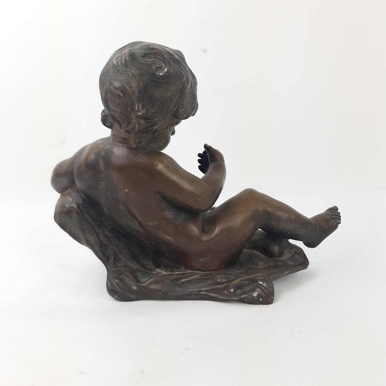 Courant Bronze Cherub Sculpture