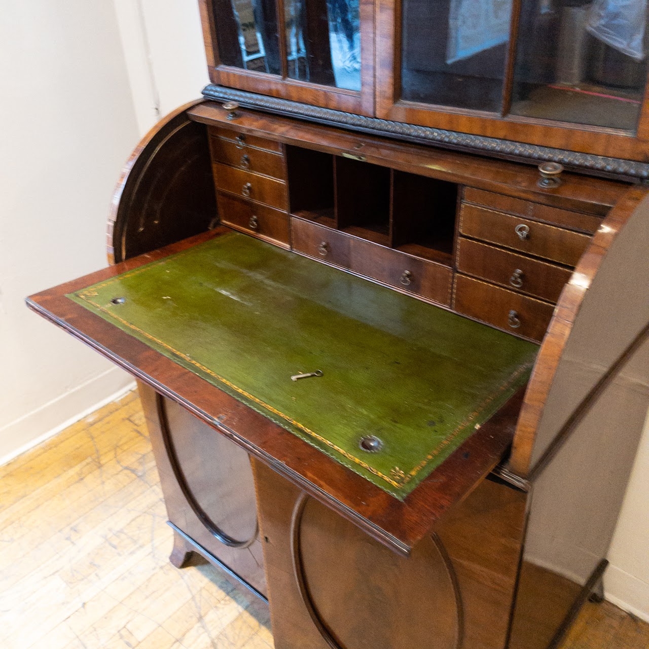 Antique Roll Front Secretary With Flame Mahogany Veneers