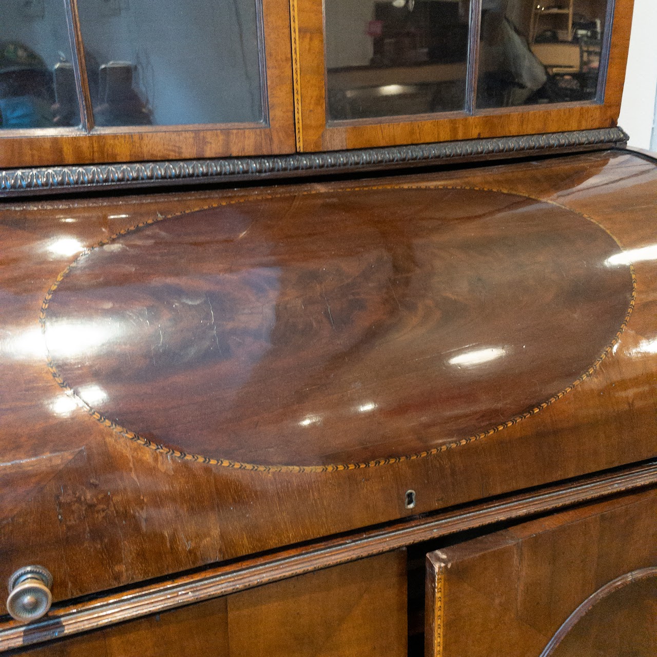 Antique Roll Front Secretary With Flame Mahogany Veneers