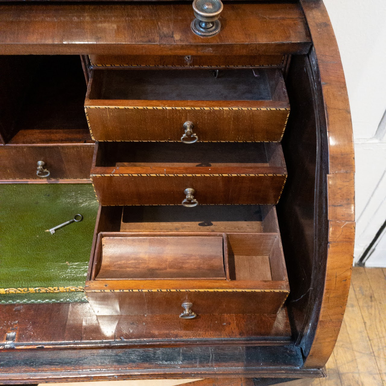 Antique Roll Front Secretary With Flame Mahogany Veneers