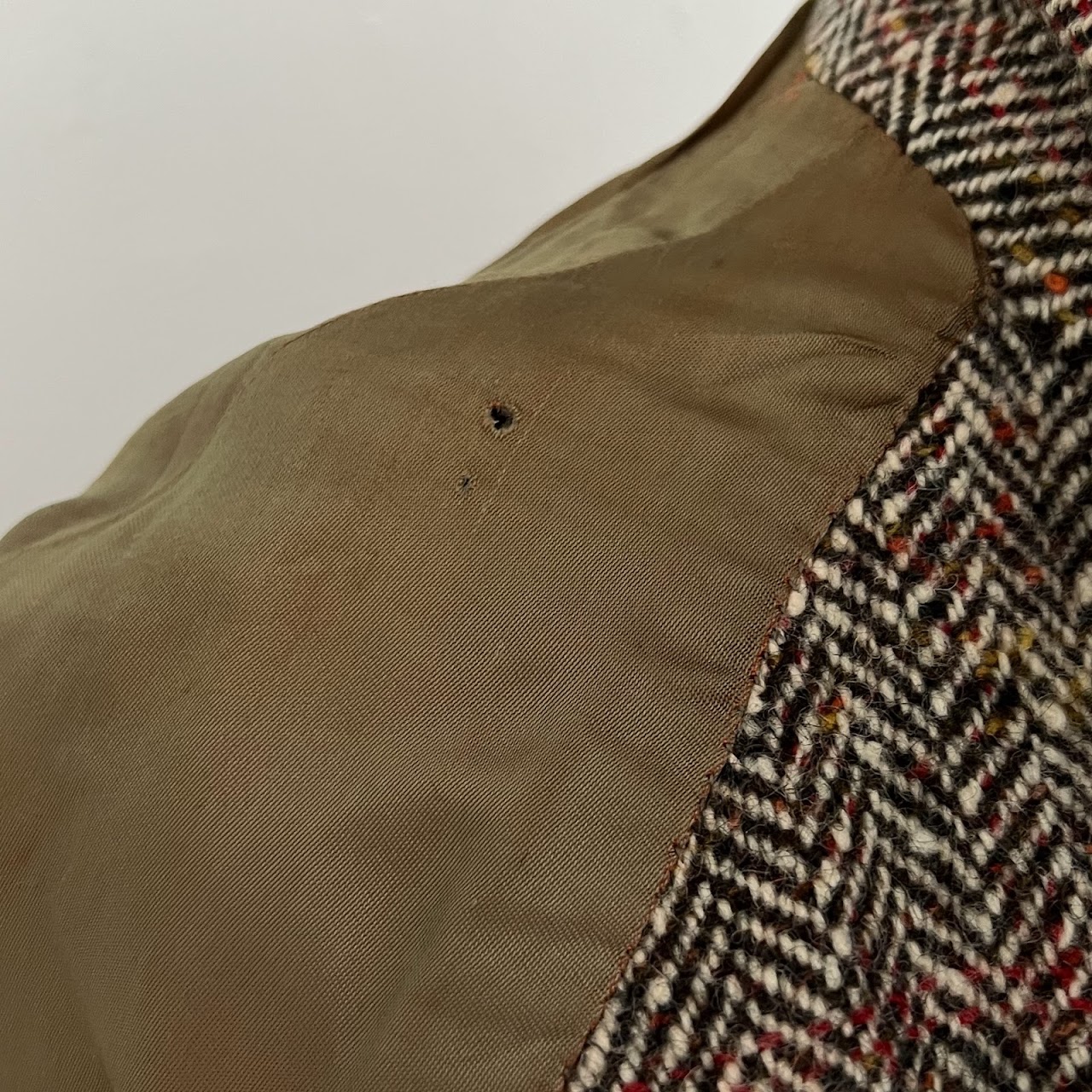 Burberry's Vintage Tweed Long Coat