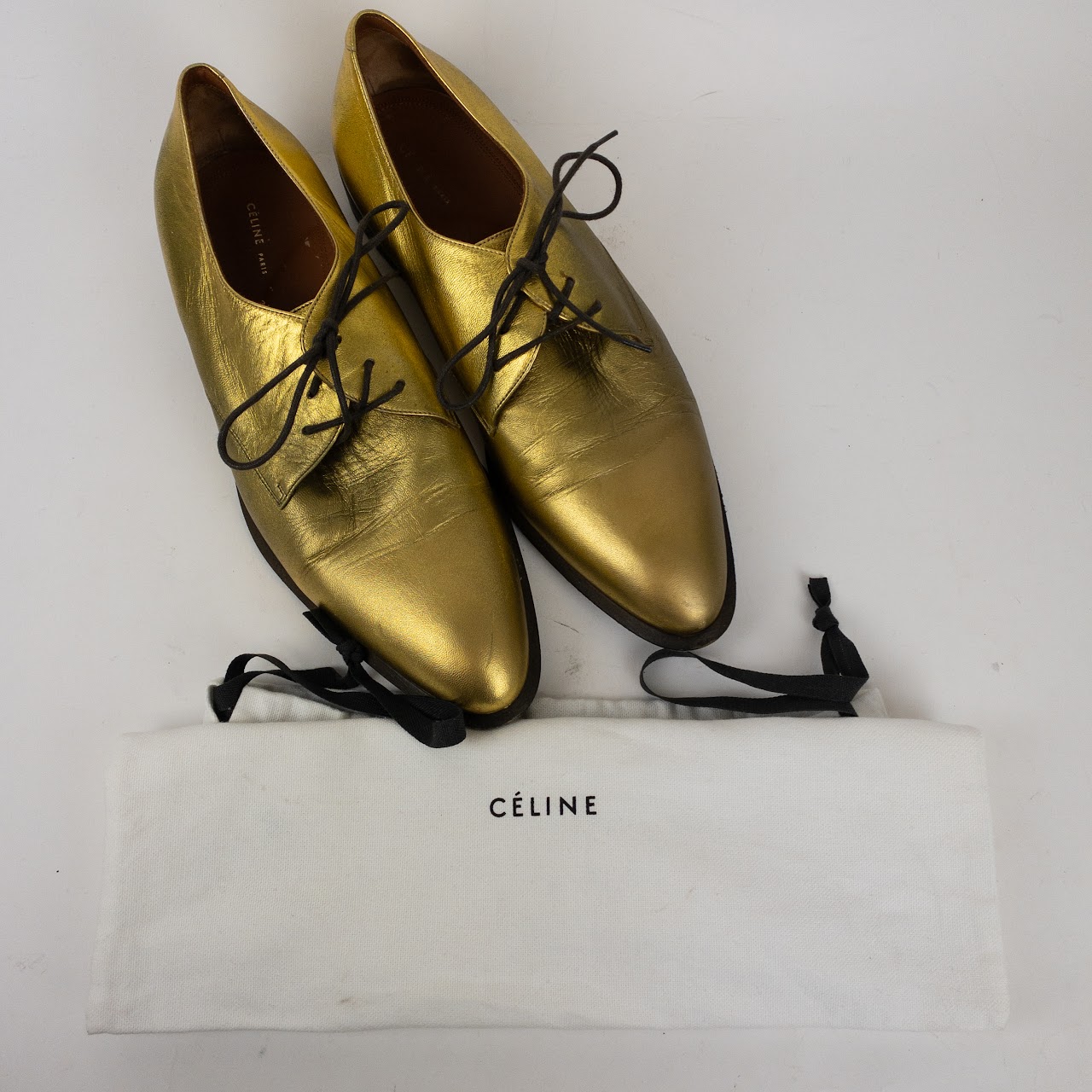 Céline Gold Leather Oxford Shoes