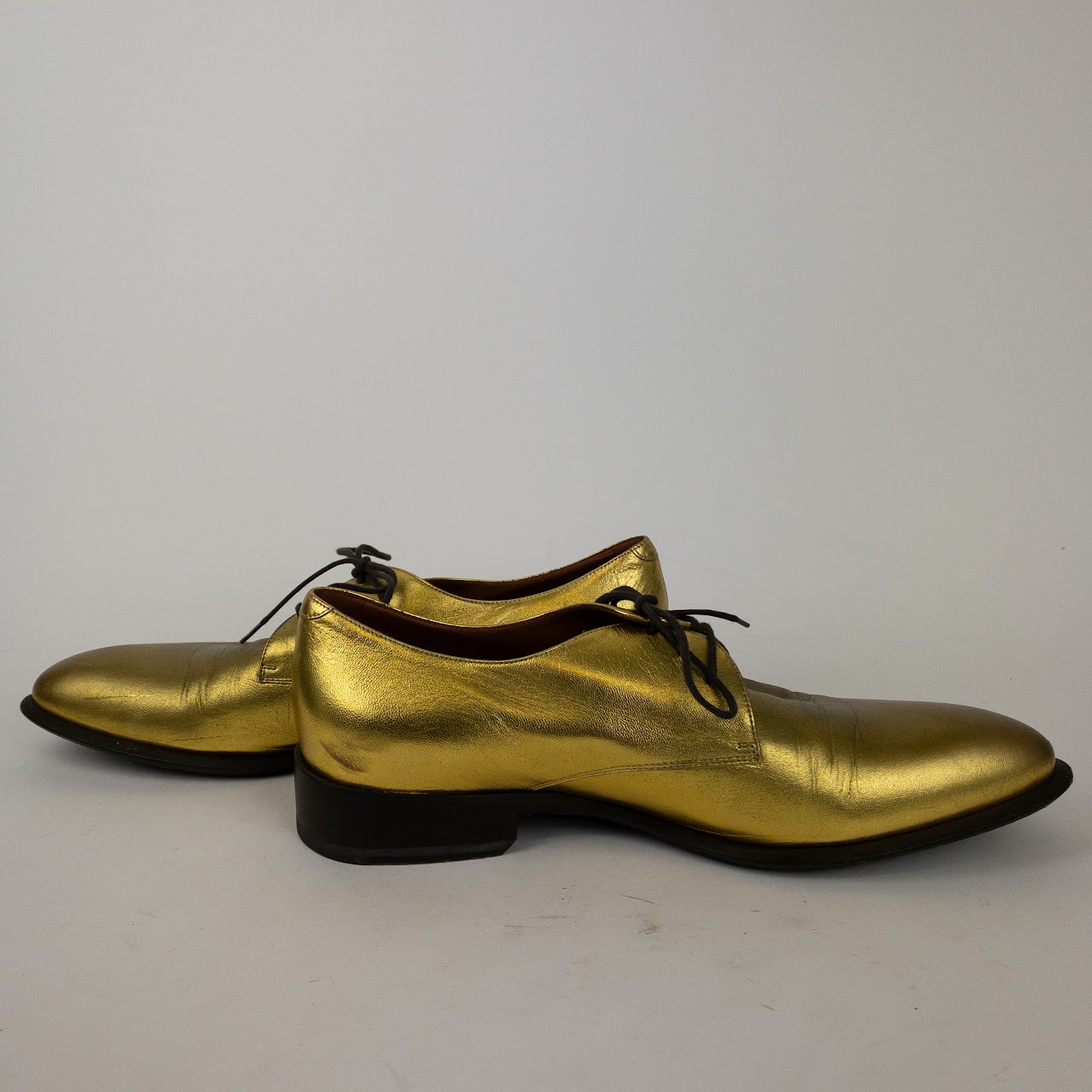 Céline Gold Leather Oxford Shoes