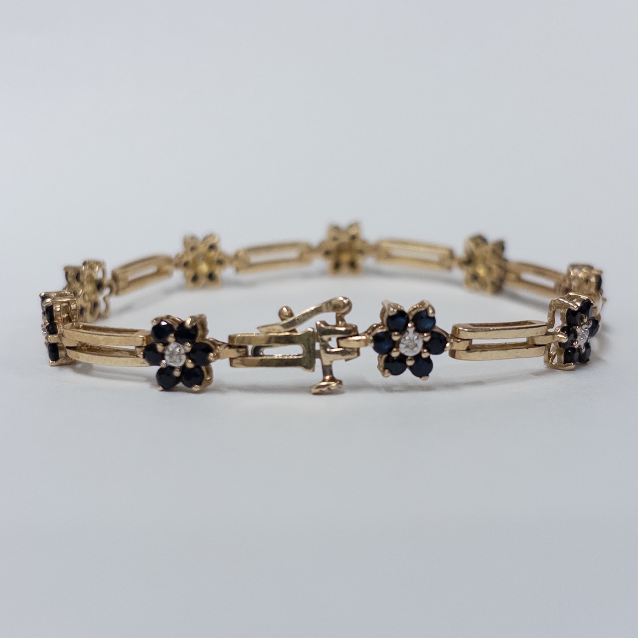 10K Gold Bracelet with Diamond and Blue Stone Blossoms