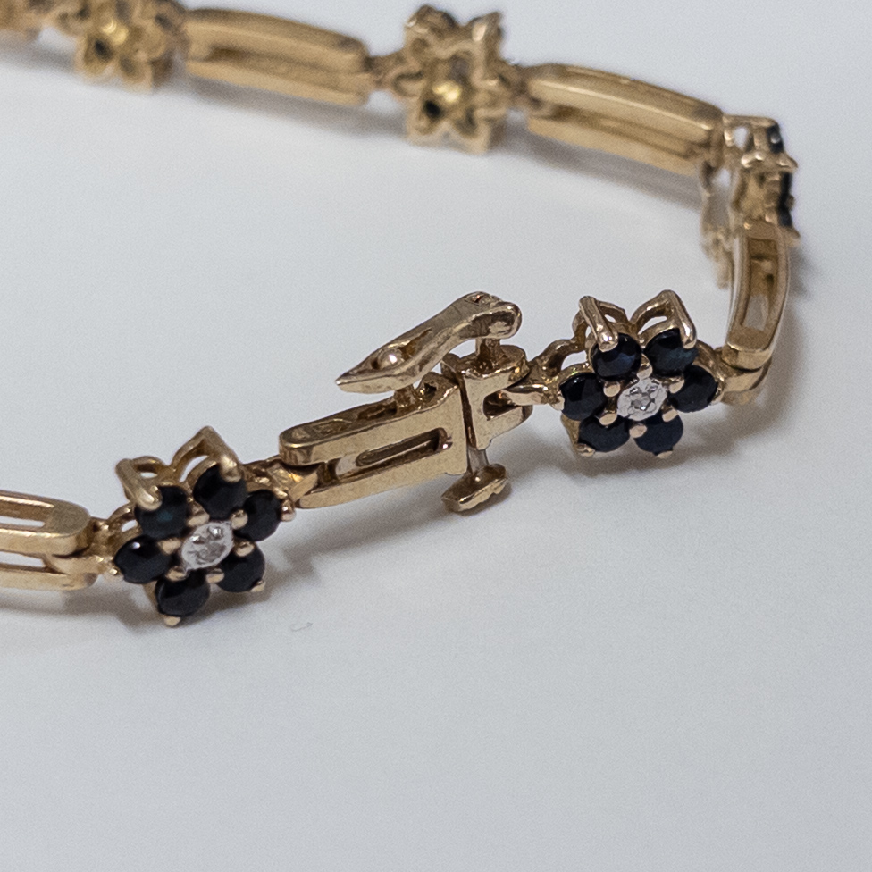 10K Gold Bracelet with Diamond and Blue Stone Blossoms