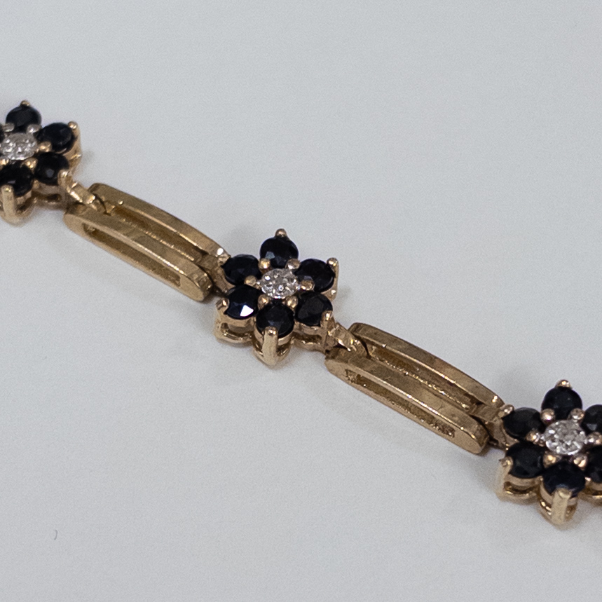 10K Gold Bracelet with Diamond and Blue Stone Blossoms