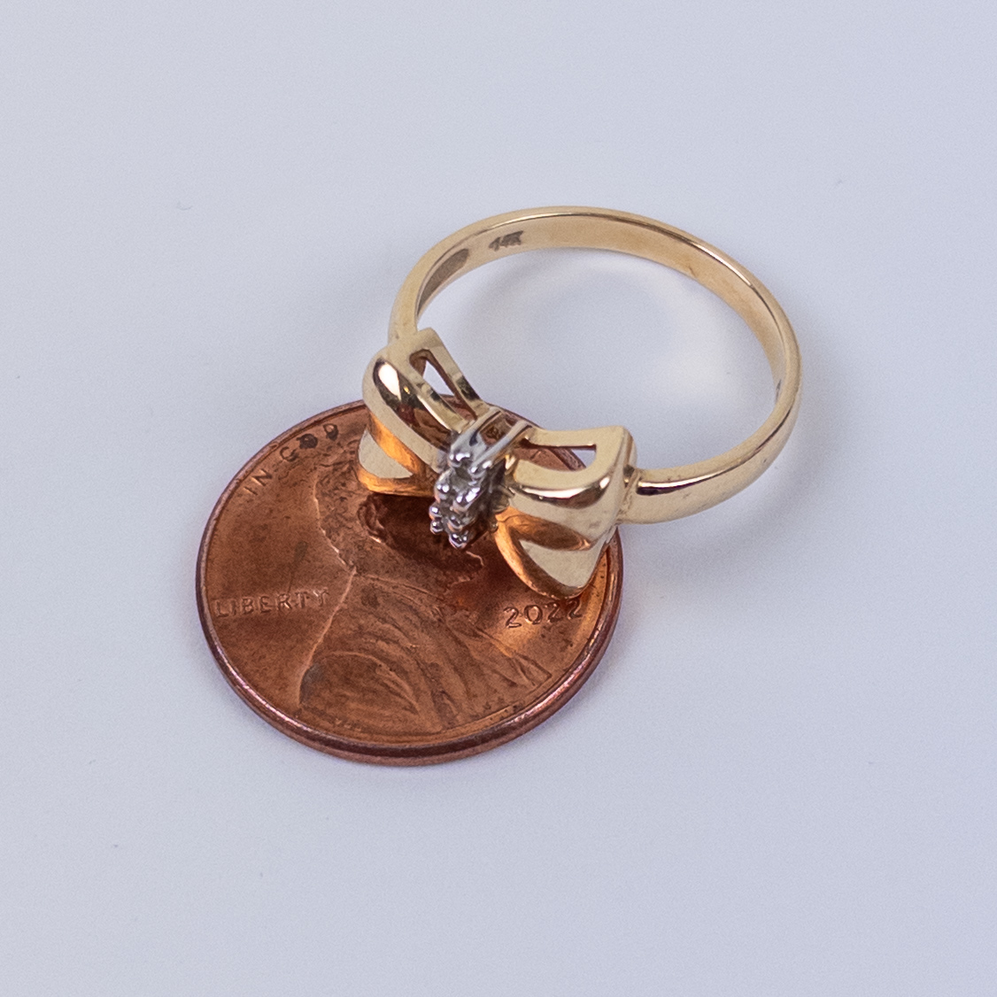 14K Gold Bow Detailed Ring with Three Tiny Diamonds