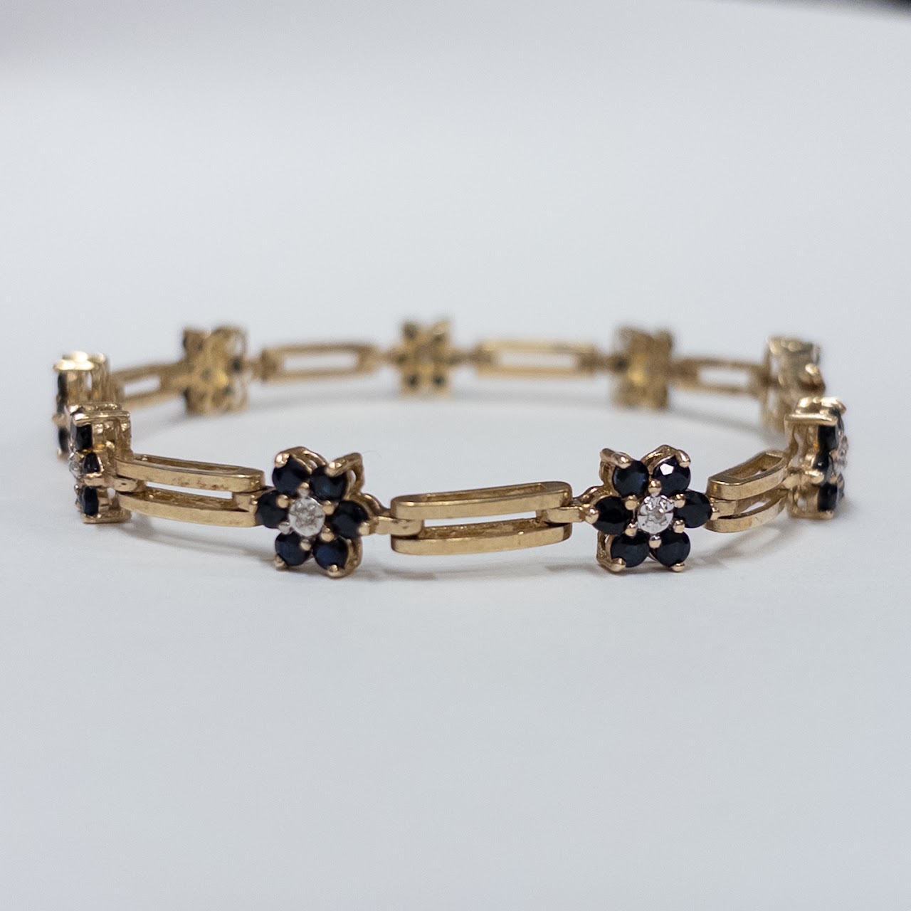 10K Gold Bracelet with Diamond and Blue Stone Blossoms