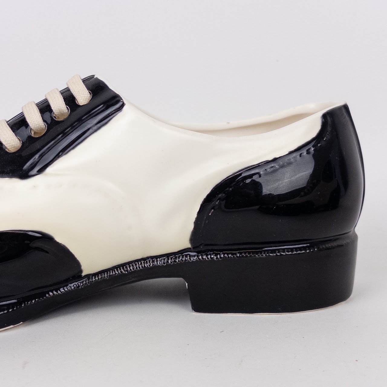 Dept. 56 Black and White Ceramic Saddle Shoe Planters (2)