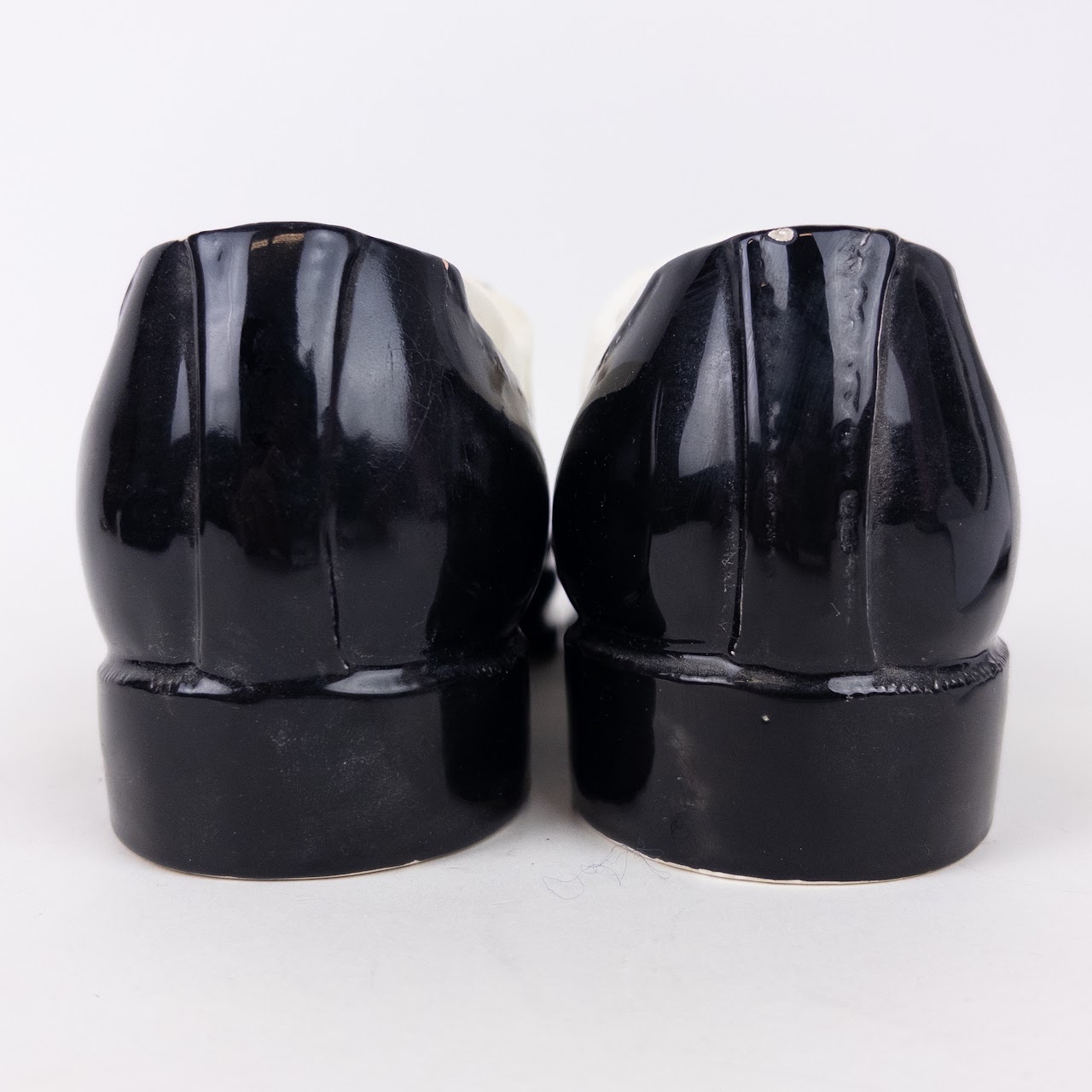 Dept. 56 Black and White Ceramic Saddle Shoe Planters (2)