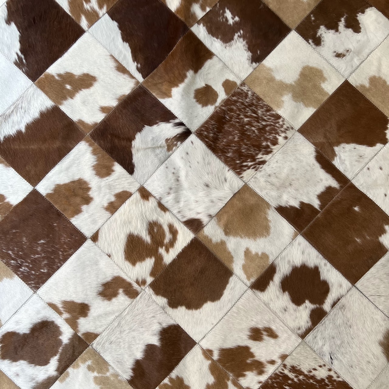 Cowhide Patchwork Area Rug