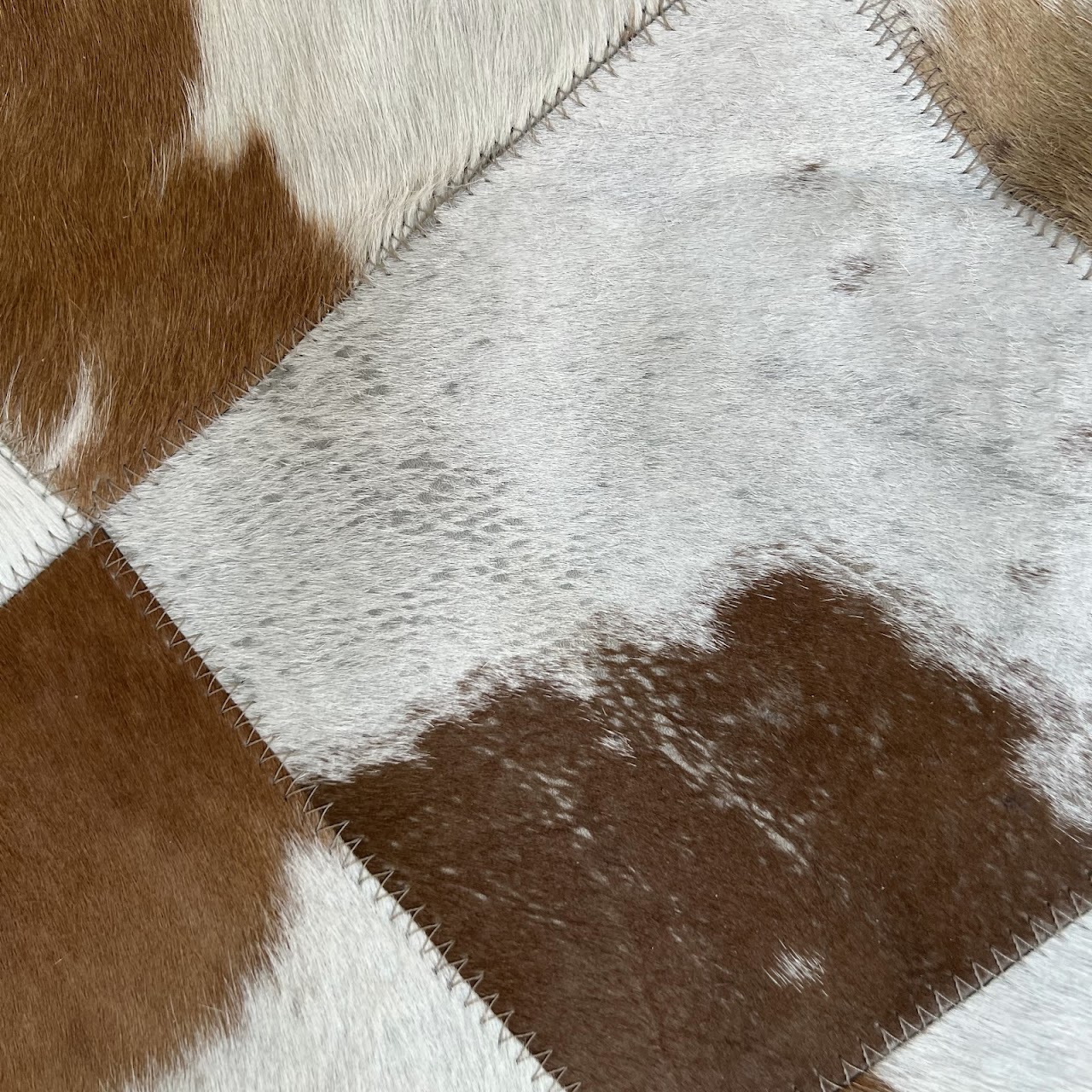 Cowhide Patchwork Area Rug