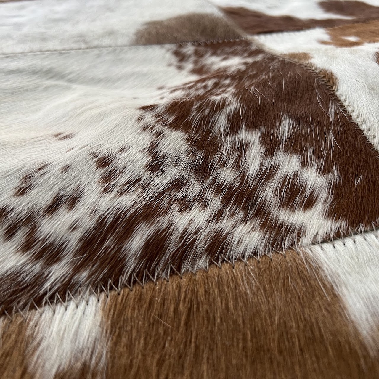 Cowhide Patchwork Area Rug