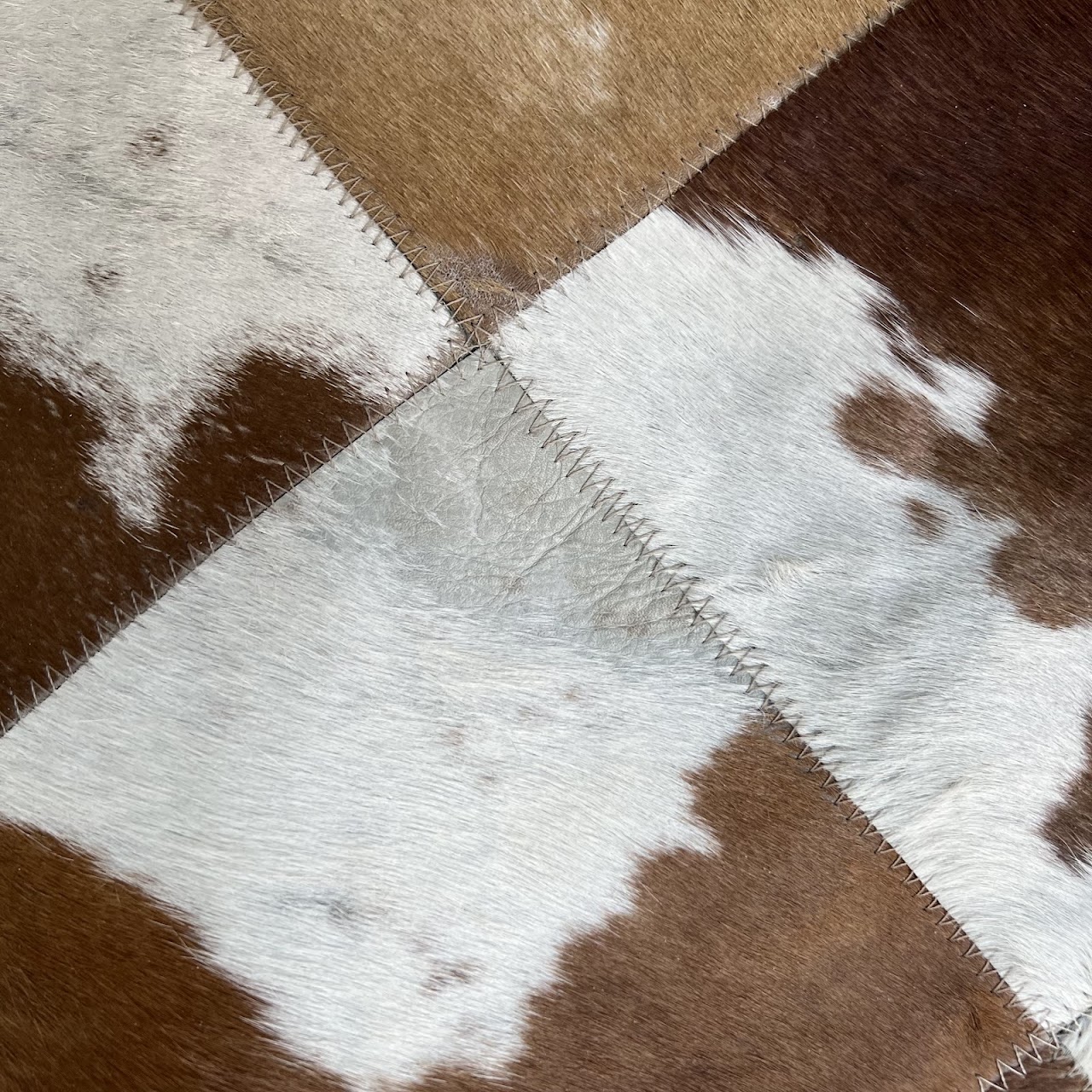 Cowhide Patchwork Area Rug