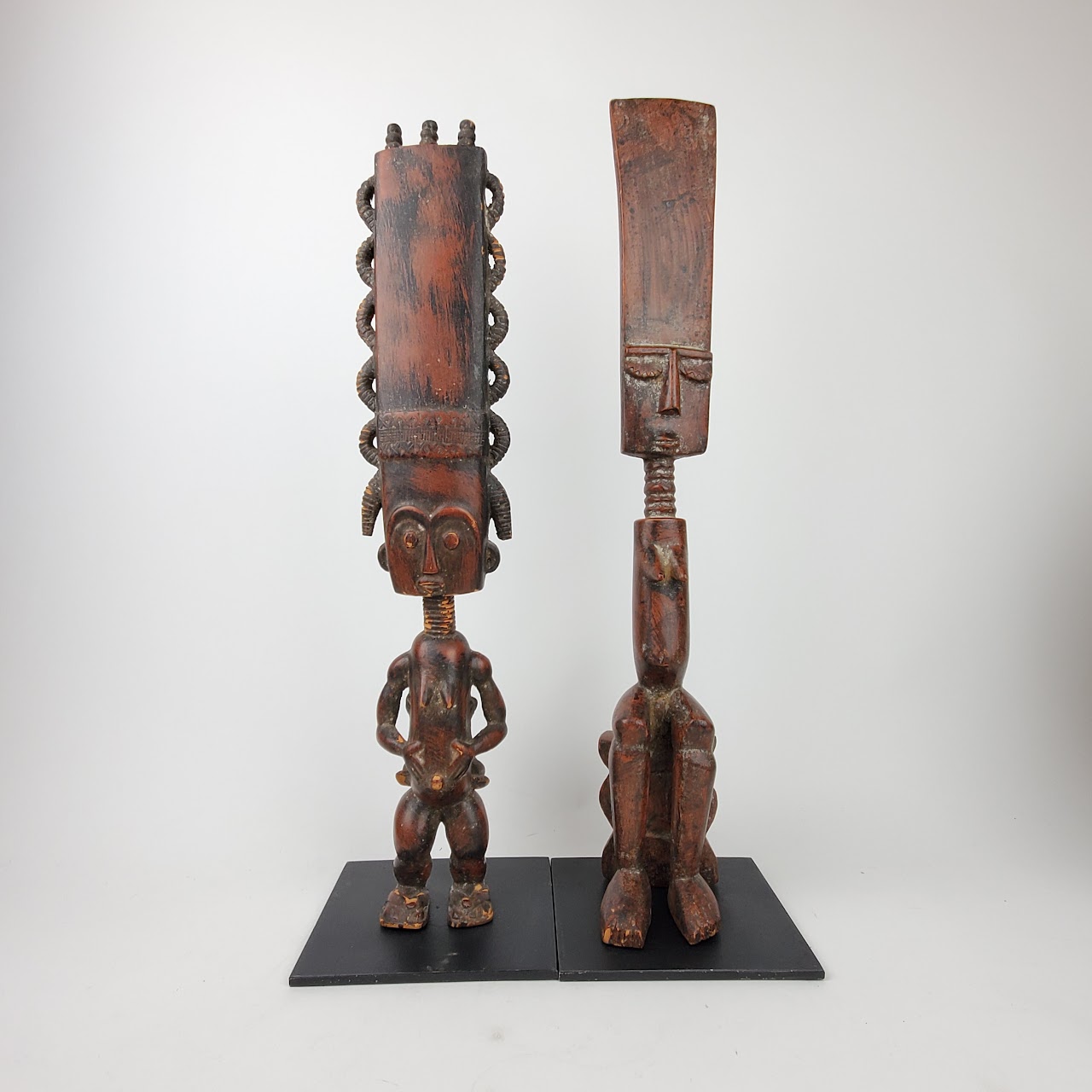 West African Headdress Statue Duo with Statue Topper