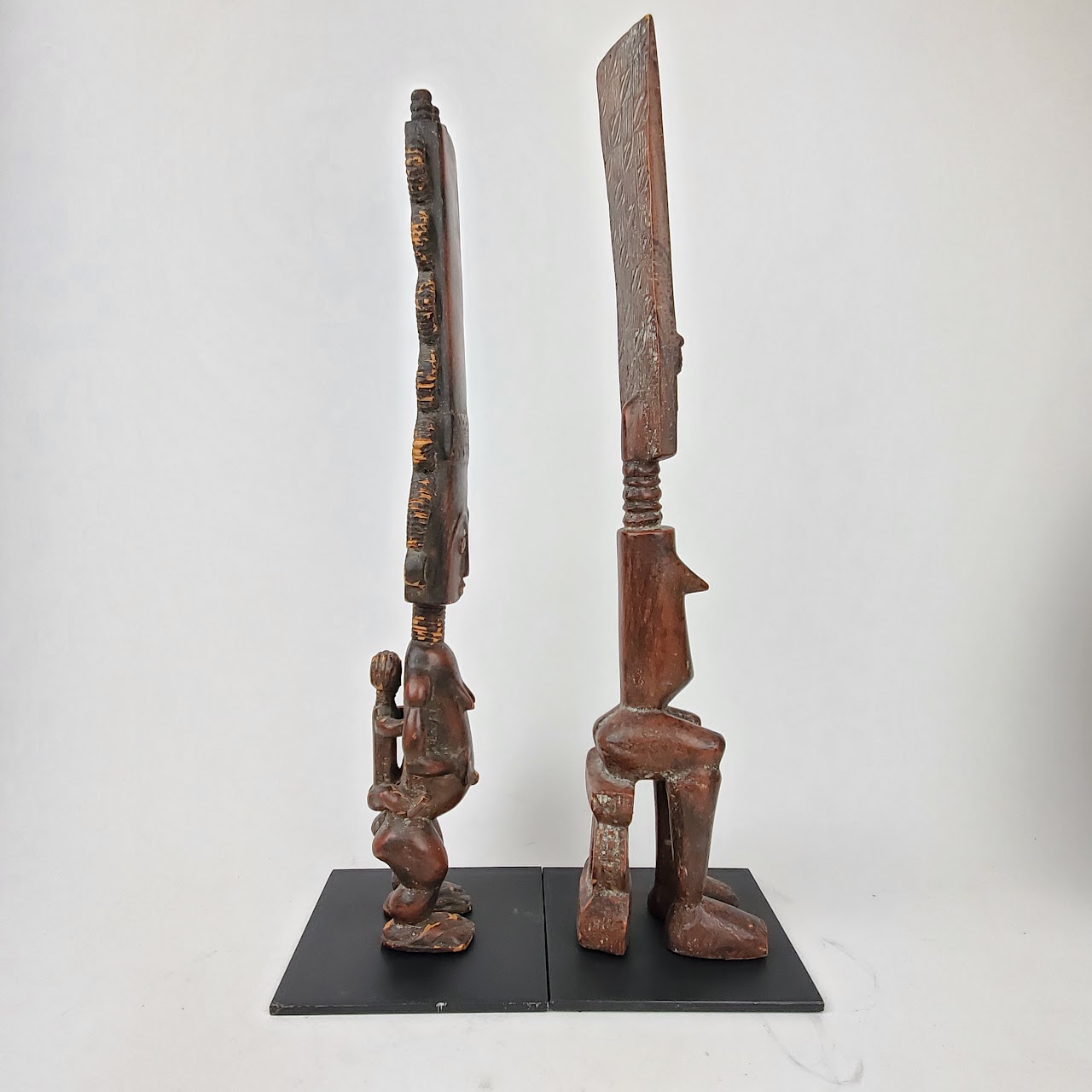 West African Headdress Statue Duo with Statue Topper