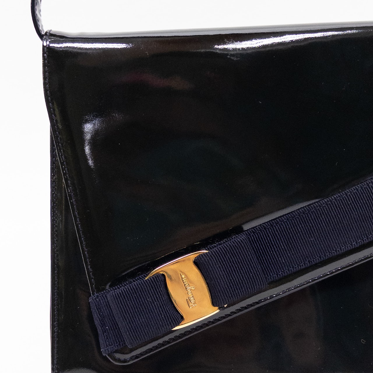 Salvatore Ferragamo Patent Leather Vara Clutch