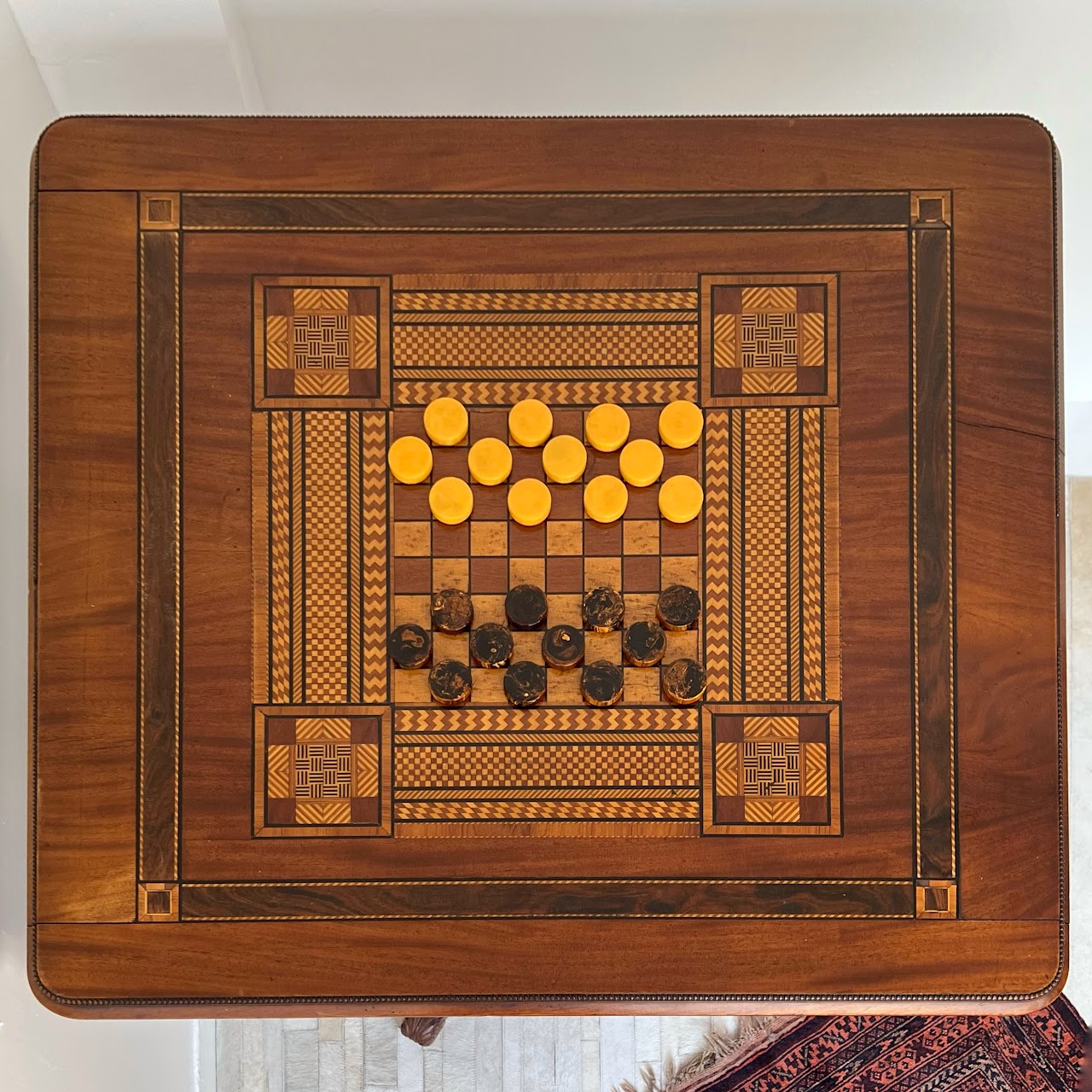 Parquetry Inlaid Mahogany Pedestal Top Game Table with Bakelite Checkers