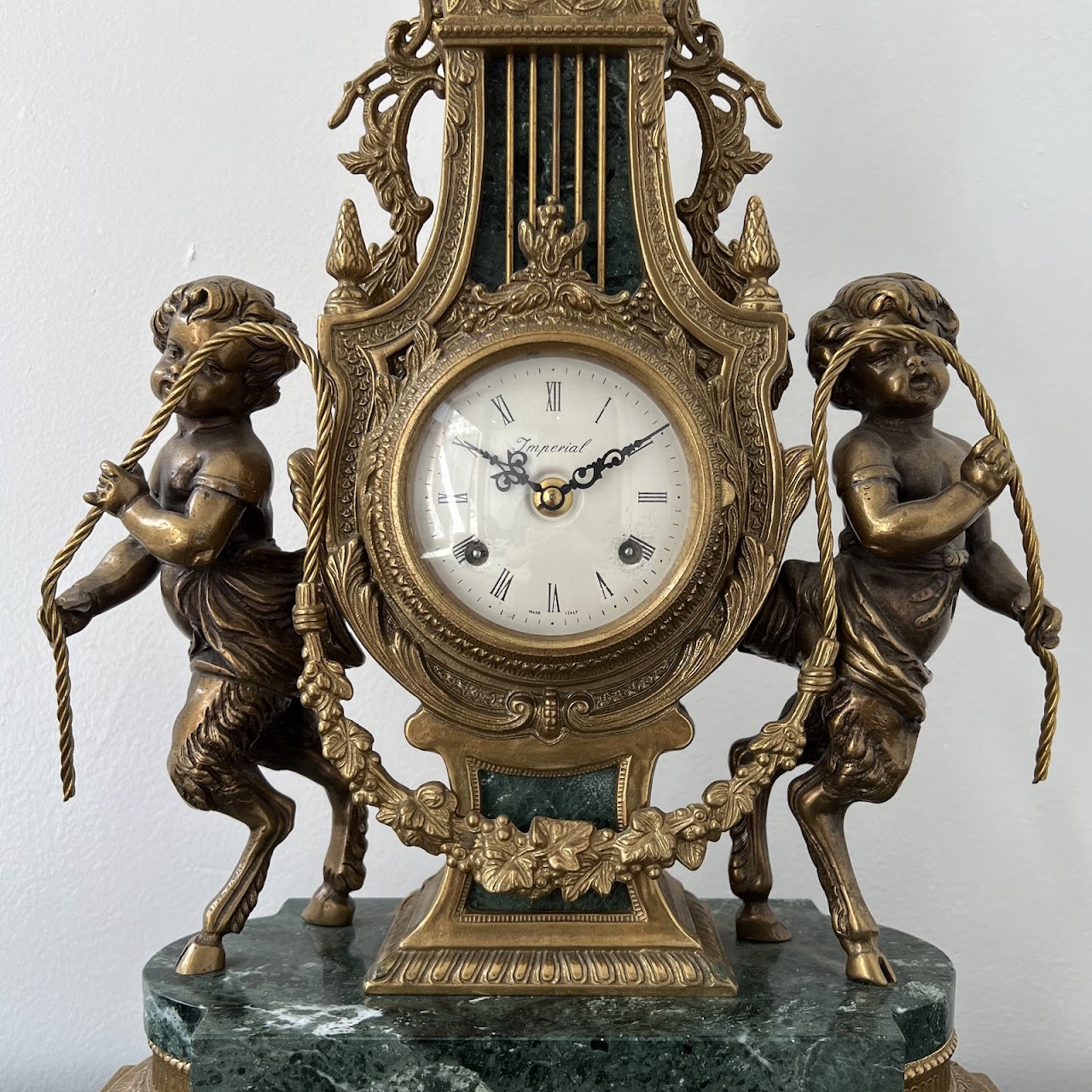 Brevettato Italian Antique Brass and Green Marble Figural Mantel Clock and Candelabra Pair