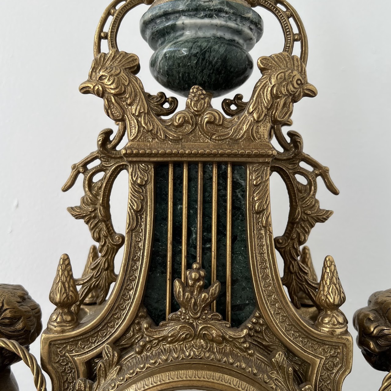 Brevettato Italian Antique Brass and Green Marble Figural Mantel Clock and Candelabra Pair